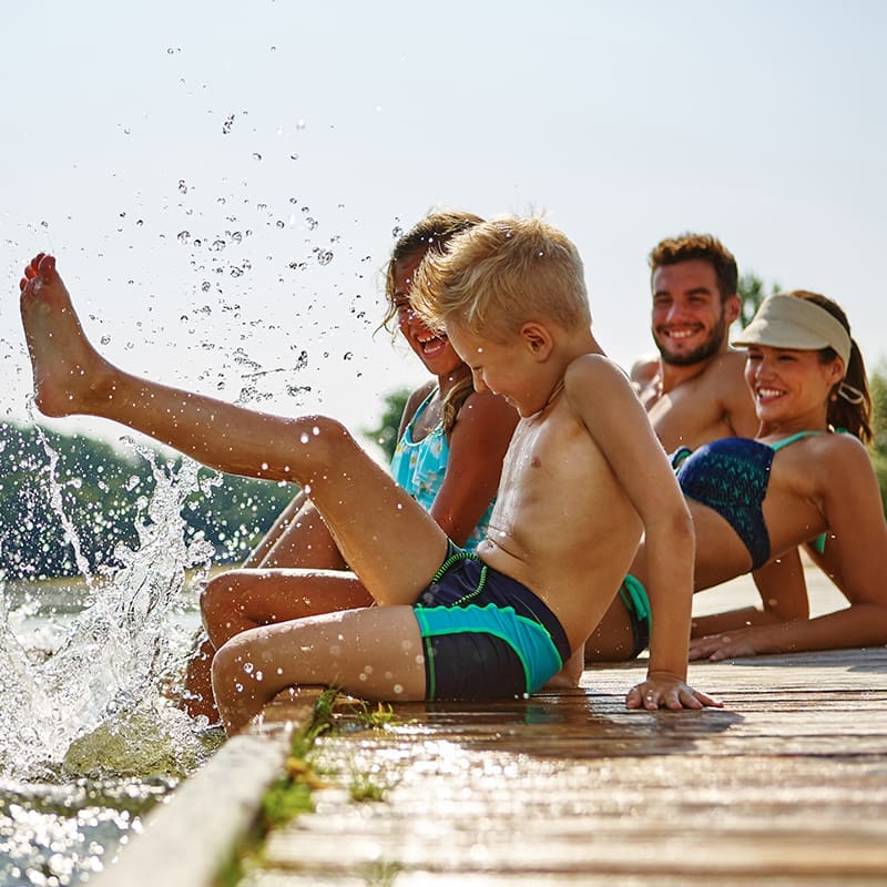 Family playing in water